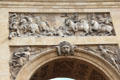 Port St.-Denis carving above arch shows Louis XIV crossing the Rhine. Paris, France.