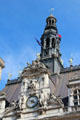Paris City Hall clock surrounded by mythological figures. Paris, France.