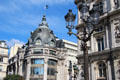 Domed corners of Bazar de l'Hotel de Ville department store across street from Paris City Hall. Paris, France.
