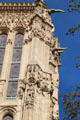 Upper level Gothic-style details of Tour St Jacques. Paris, France.