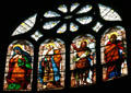 Stained glass with saints at St Eustache Les Halles. Paris, France.