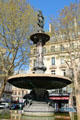 Fountain near Palais Royale. Paris, France.