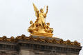 Gilded Poetry sculpture by Charles-Alphonse Guméry atop Opéra Garnier. Paris, France.