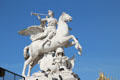 Fame riding Pegasus sculpture by Antoine Coysevox beside entrance gates to Tuileries Garden. Paris, France.