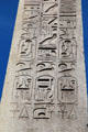 Hieroglyphics exalting reign of pharaoh Ramesses II on Luxor Obelisk at Place de la Concorde. Paris, France.