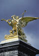 Gilded trumpeter with horse on pillar of Alexandre III bridge. Paris, France.