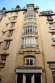 Curved windows at Immeuble Jassedé. Paris, France.