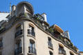 Art Nouveau roofline at 17-19-21 rue Jean de la Fontaine. Paris, France.