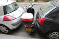 Daring parking scenario in Paris. Paris, France.