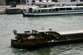Barge traffic on Seine. Paris, France.