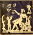 Cameo glass of Satyr handing grapes to infant Bacchus from Italy at Petit Palace Museum. Paris, France