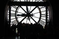Silhouette of visitors against former station clock face at Musée d'Orsay. Paris, France.