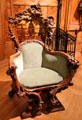 Sculpted wooden armchair which belonged to Sarah Bernhardt at Musée d'Orsay. Paris, France.