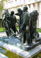 Monument to Burghers of Calais by Auguste Rodin with six leaders wearing robes of condemned at Rodin Museum. Paris, France.