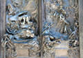 Lower details of Gates of Hell doors with writhing souls without hope by Auguste Rodin at Rodin Museum. Paris, France.