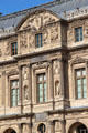 Carving details of Lescot wing of Louvre Palace. Paris, France.