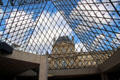 View out from glass pyramid at Louvre Museum. Paris, France