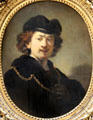 Self-portrait in toque & gold chain by Rembrandt at Louvre Museum. Paris, France