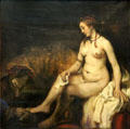 Bathsheba at her bath holding letter of David painting by Rembrandt at Louvre Museum. Paris, France.