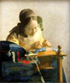The Lace Maker painting by Jan Vermeer at Louvre Museum. Paris, France.