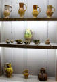 Showcase of early French pottery at Sèvres National Ceramic Museum. Paris, France.