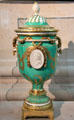 Sèvres porcelain flame vase by Jean Baptiste Etienne Genest, et al with profile of Louis XV at Sèvres National Ceramic Museum. Paris, France