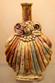 Glazed earthenware pilgrim's gourd from Saintonge, France at Sèvres National Ceramic Museum. Paris, France.