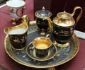 Porcelain blue & gold tea set by Manufacture Dagoty of Paris at Sèvres National Ceramic Museum. Paris, France