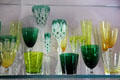 Baccarat green cut glass goblets at Baccarat Museum. Paris, France