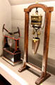 Lab device to study transmission of pressure in liquids & large natural magnet at Arts et Metiers Museum. Paris, France.