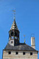 Octagonal clock tower spire with zig-zag design atop Conciergerie. Paris, France.