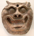 Chinese terra cotta mask at Guimet Museum. Paris, France.