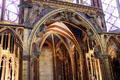Gothic arches with carved angels in what was once Royal Chapel of Medieval French kings at St Chapelle. Paris, France.