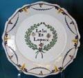 Earthenware plate inscribed "Law & Peace" from Nevers at Carnavalet Museum. Paris, France.
