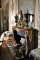 Fireplace with clock & Sèvres vases in Council Study at Versailles Palace. Versailles, France.