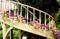 Flowers on spiral staircase of Billiard House at Marie Antoinette farm. Versailles, France