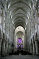 Nave rising to great height, vaulting & stained glass in interior of Cathédrale Notre-Dame. Laon, France.