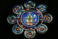 Central medallion of north rose window which represents liberal arts of the time at Cathédrale Notre-Dame. Laon, France