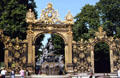Highly ornate gilded gates by Jean Lamour & Rococo fountain on Place Stanislas. Nancy, France.