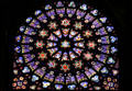 Rose window on south transept with symbols of Zodiac shows Creation at St-Denis Basilica. St Denis, France.
