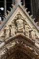 Christ, after crucifixion, with female saints over portal of Reims Cathedral. Reims, France.