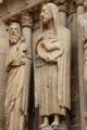 Saints including John the Baptist holding their symbols on Reims Cathedral. Reims, France.