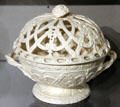 White ceramic bowl with lattice-work cover made in France at Museum of Fine Arts. Reims, France.