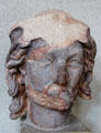 Head of Christ in pilgrim dress statue removed from west facade of Reims Cathedral at Tau Palace Museum. Reims, France.