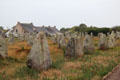 Menhirs with small village in background. Carnac, France.