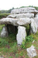 Dolmen, two vertical megaliths supporting large stone capstones, at Kermario Alignments. Carnac, France