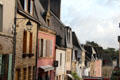 Street sloping down to historic port & St. Goustan Quarter. Auray, France.