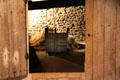 View from kitchen, original part of one room house, into barn at Jacques Cartier Manor House Museum. St Malo, France.