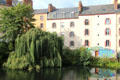 View of La Vilaine River with Weeping Willow tree. Rennes, France.