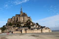 Mont-St-Michel surrounded by tidal flats at low tide. Mont-St-Michel, France.